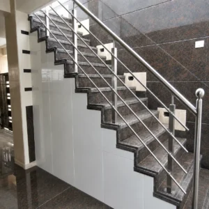 Modern stainless steel staircase railing system with horizontal handrails for residential and commercial buildings